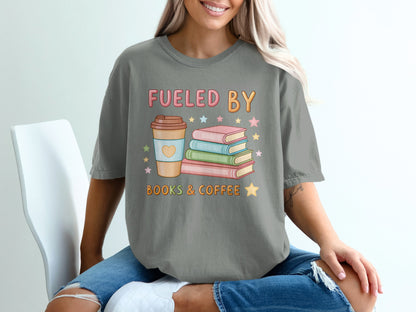 Gray t-shirt with "Fueled by Books & Coffee" and illustrated coffee cup and books.