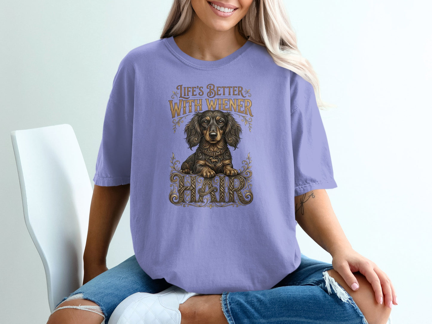 Purple t-shirt with "Life's Better With Wiener" text and dachshund graphic.