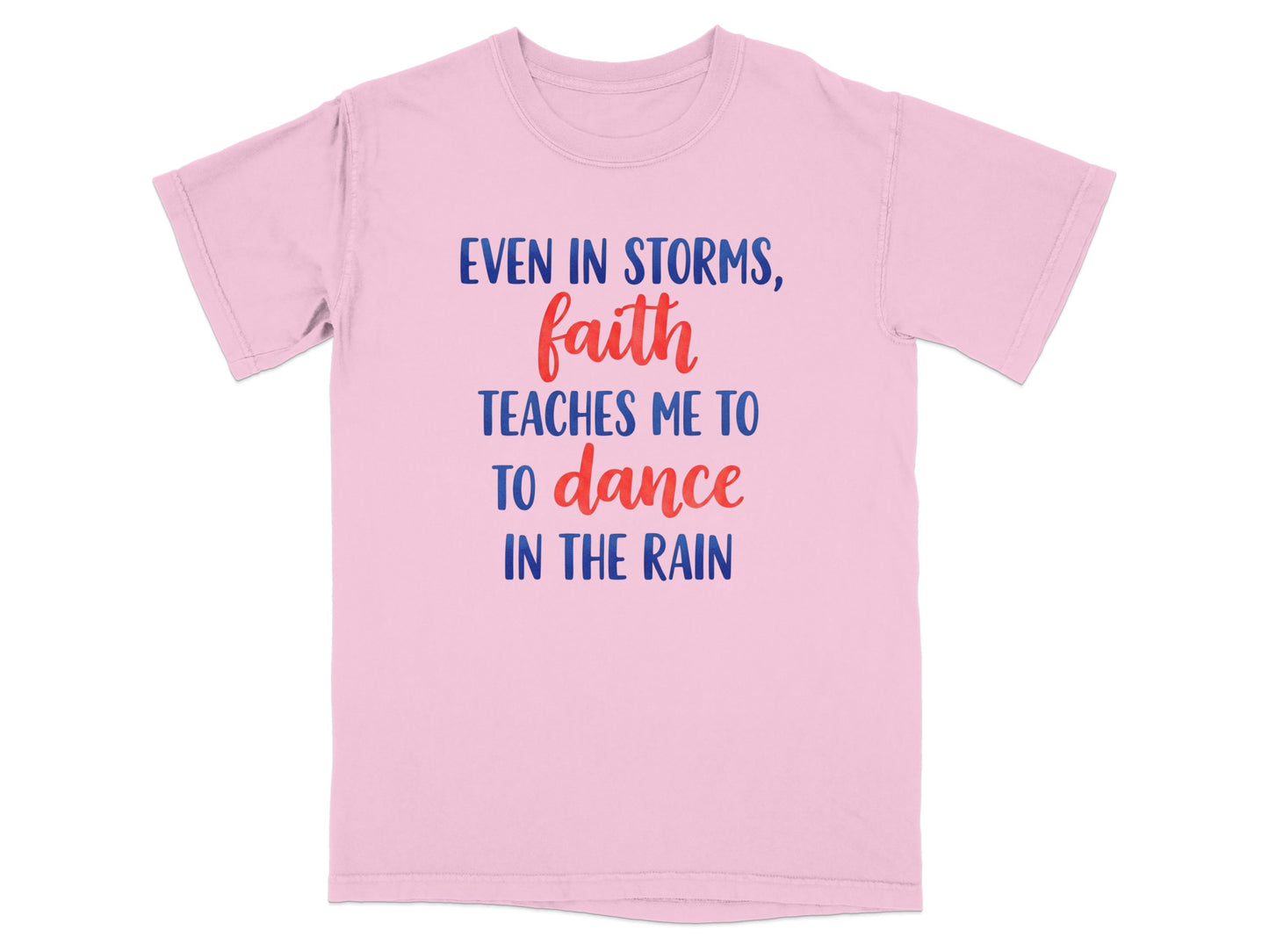 Pink t-shirt with "Even in storms, faith teaches me to dance in the rain" text.