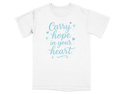 White t-shirt with "Carry hope in your heart" text in blue.