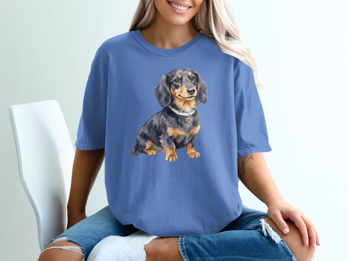 Watercolor illustration of a long-haired dachshund wearing a collar with a heart tag.