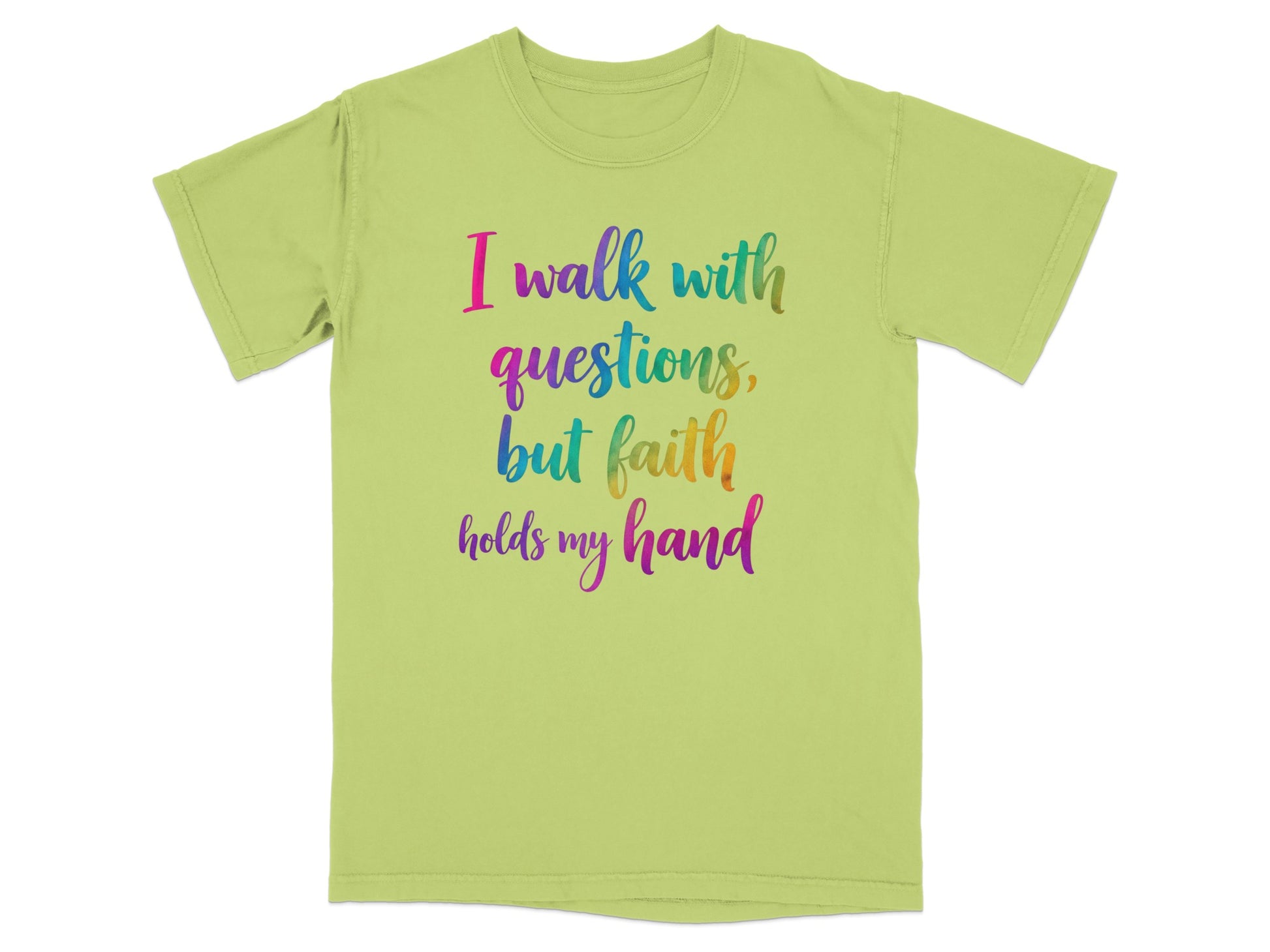 Light green t-shirt with "I walk with questions, but faith holds my hand" in rainbow text.