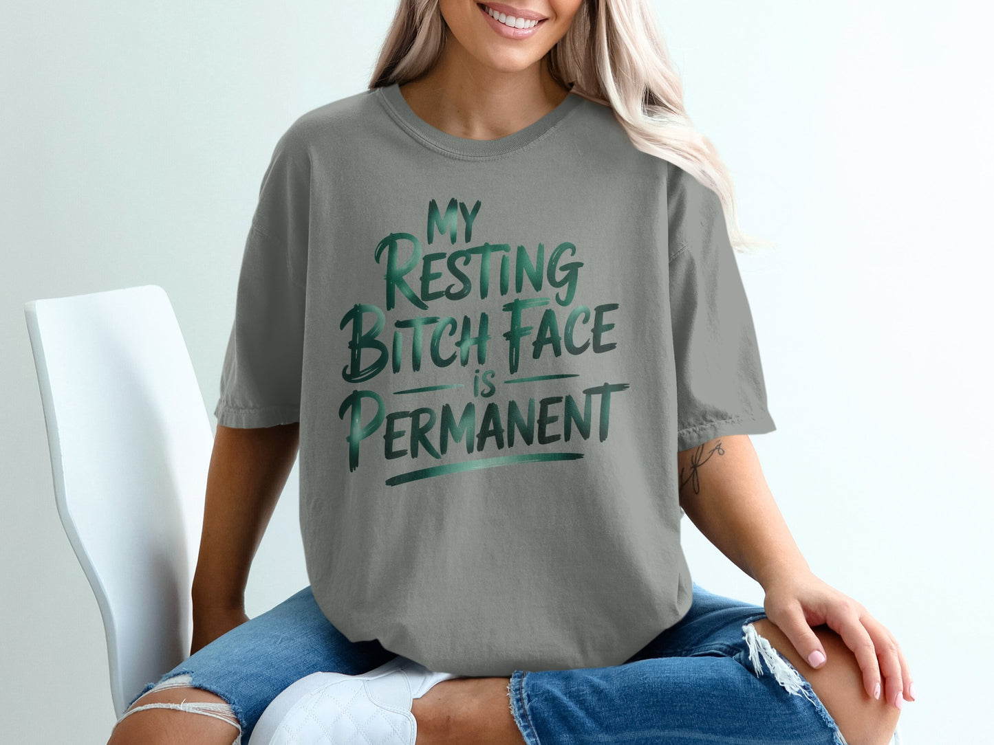Gray t-shirt with green gradient text "MY RESTING BITCH FACE IS PERMANENT".