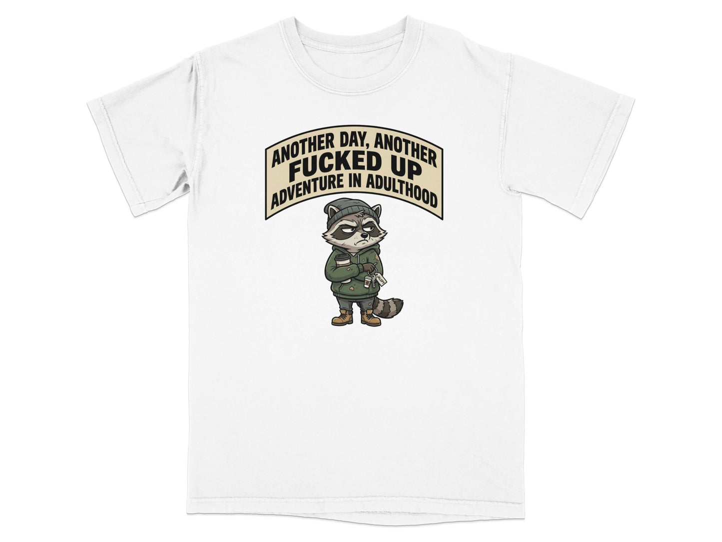 T-shirt with a raccoon wearing a hoodie and saying "Another day, another adventure in adulthood."