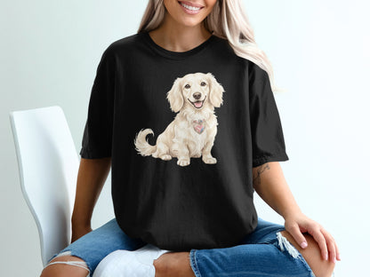 Black t-shirt with a cream-colored dachshund wearing a pink heart collar.