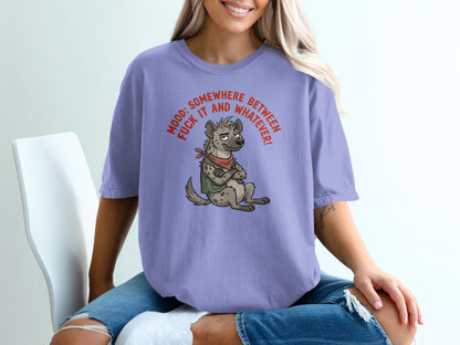 Lilac t-shirt with a cartoon hyena and text "MOOD: SOMEWHERE BETWEEN FUCK IT AND WHATEVER!"