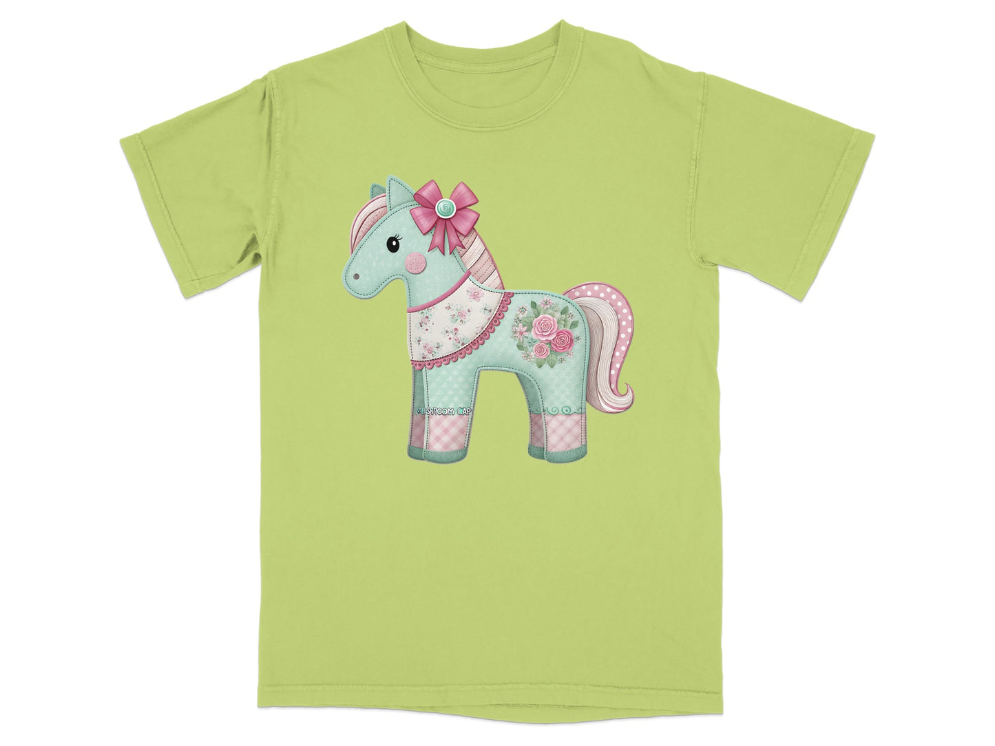 Light green t-shirt with a cartoon horse applique wearing a pink bow.