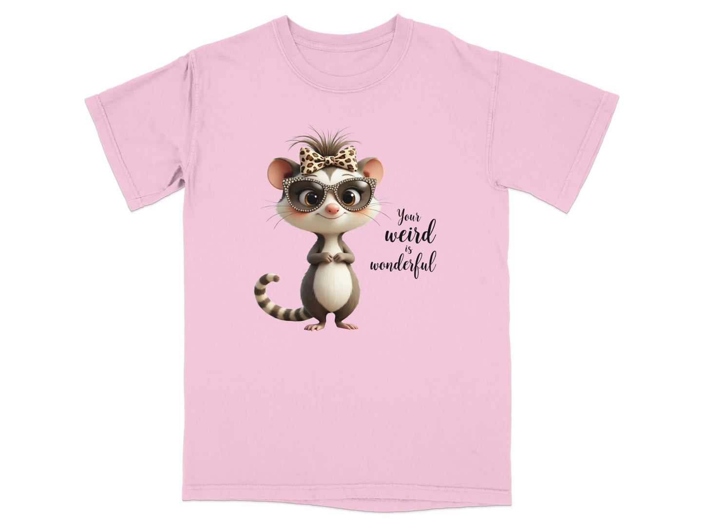 Pink t-shirt with cartoon opossum wearing glasses and bow, text "Your weird is wonderful".