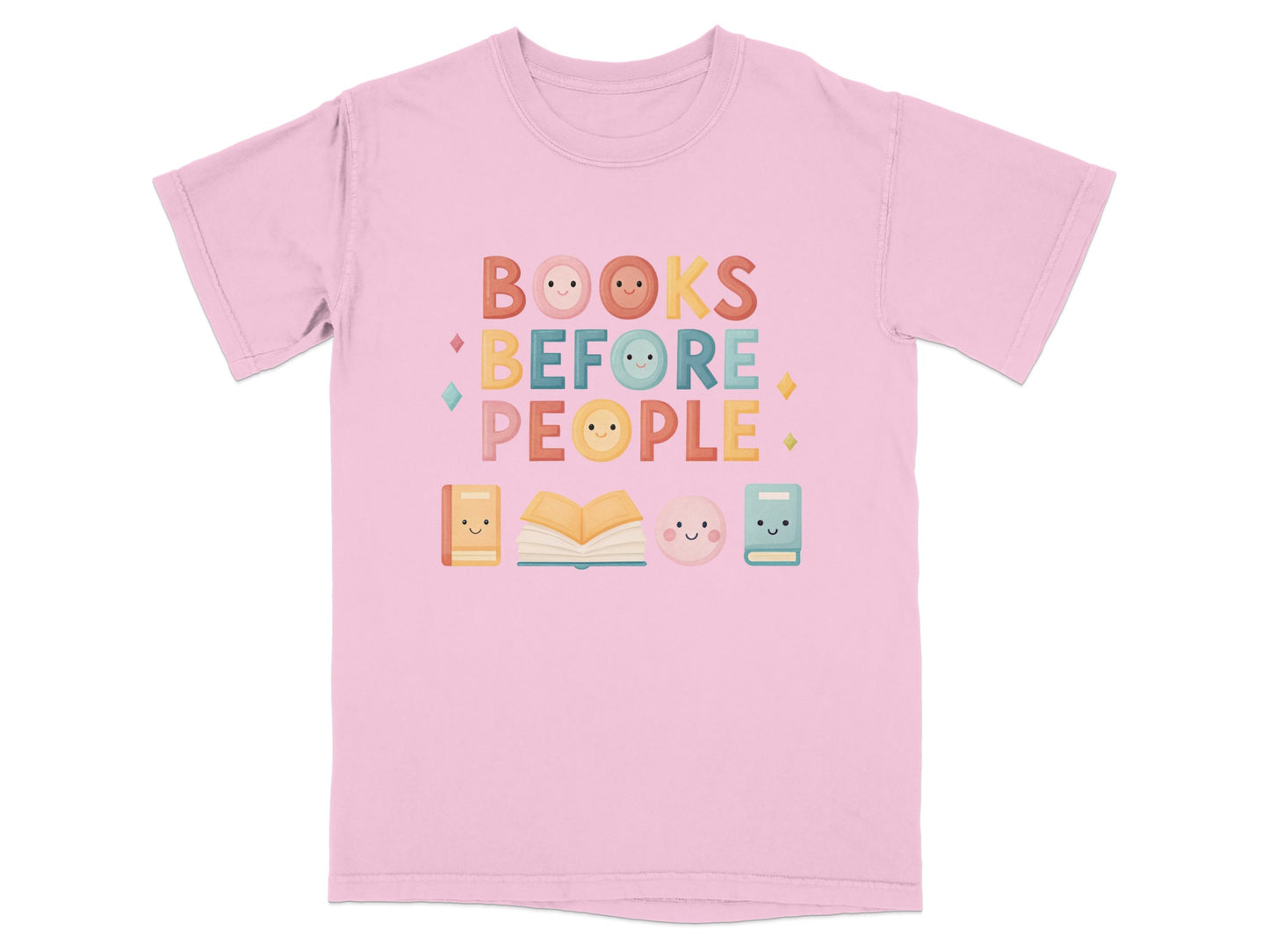 Pink t-shirt with "Books Before People" text and kawaii book and button graphics.