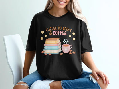 Black t-shirt featuring stack of books, coffee cup, and text "Fueled by Books & Coffee".