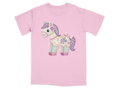 Pink t-shirt with a patchwork horse graphic.