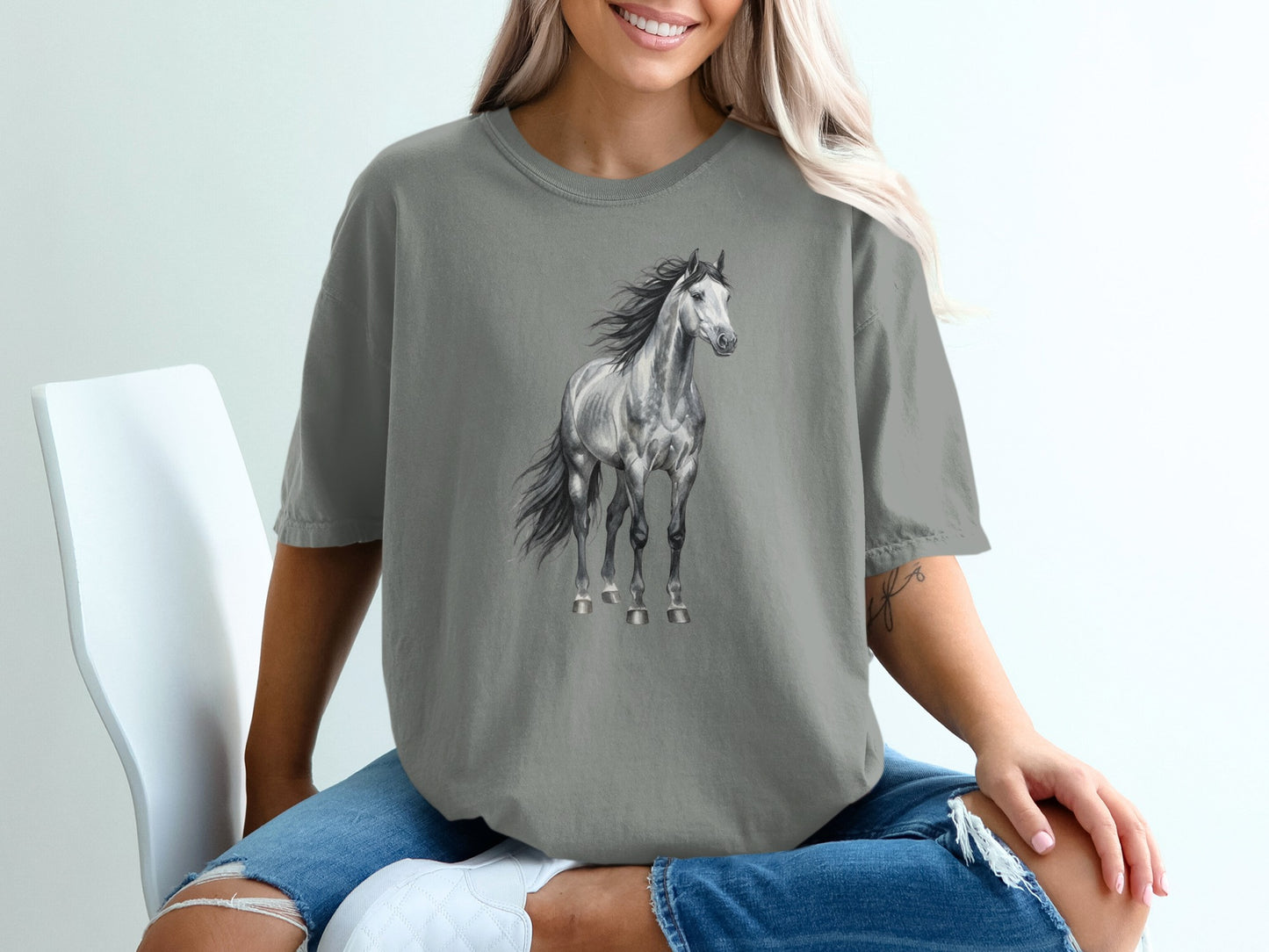 Gray t-shirt with a realistic black and white illustration of a horse.