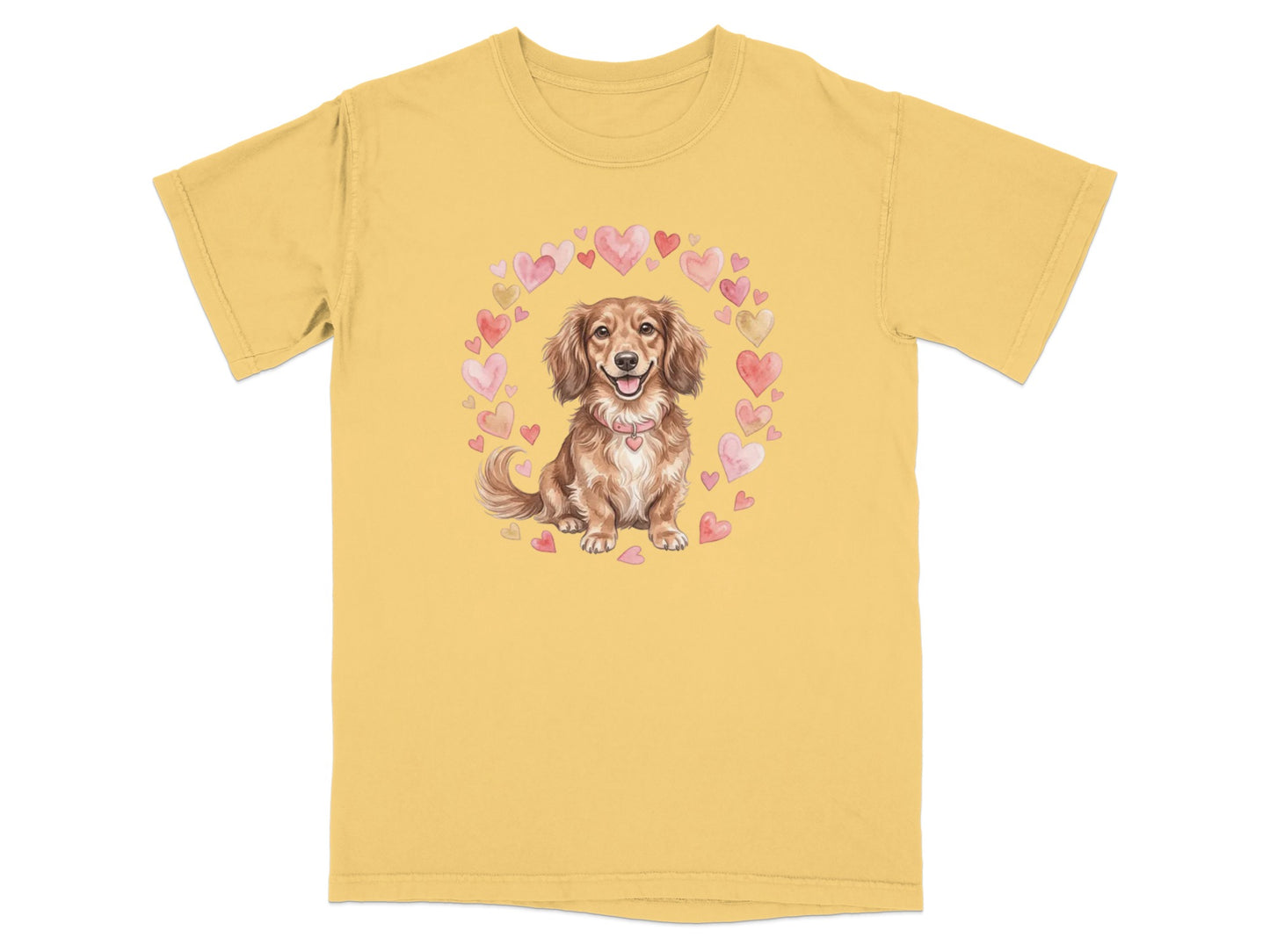 Dachshund with watercolor hearts framed on a yellow t-shirt.