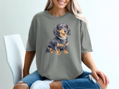 Watercolor dachshund wearing a heart-shaped collar on a gray t-shirt.