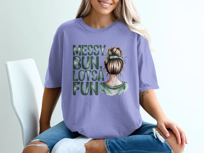 Purple t-shirt with "Messy Bun, Lotsa Fun" text and a watercolor illustration of a woman's head.