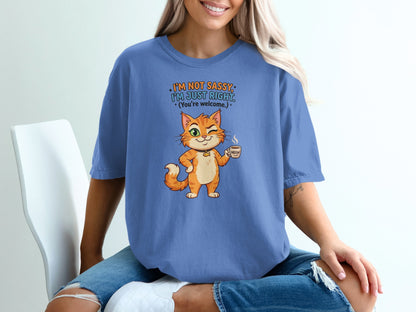 Cat holding coffee mug with text "I'm not sassy, I'm just right."