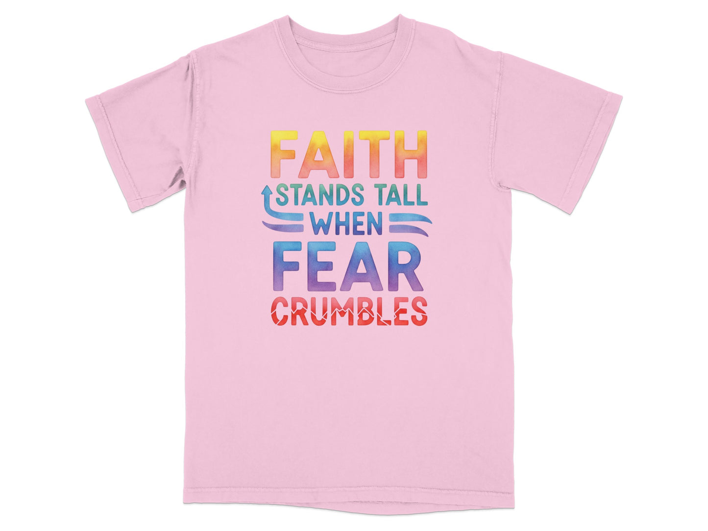 Pink t-shirt with rainbow text: "FAITH STANDS TALL WHEN FEAR CRUMBLES".