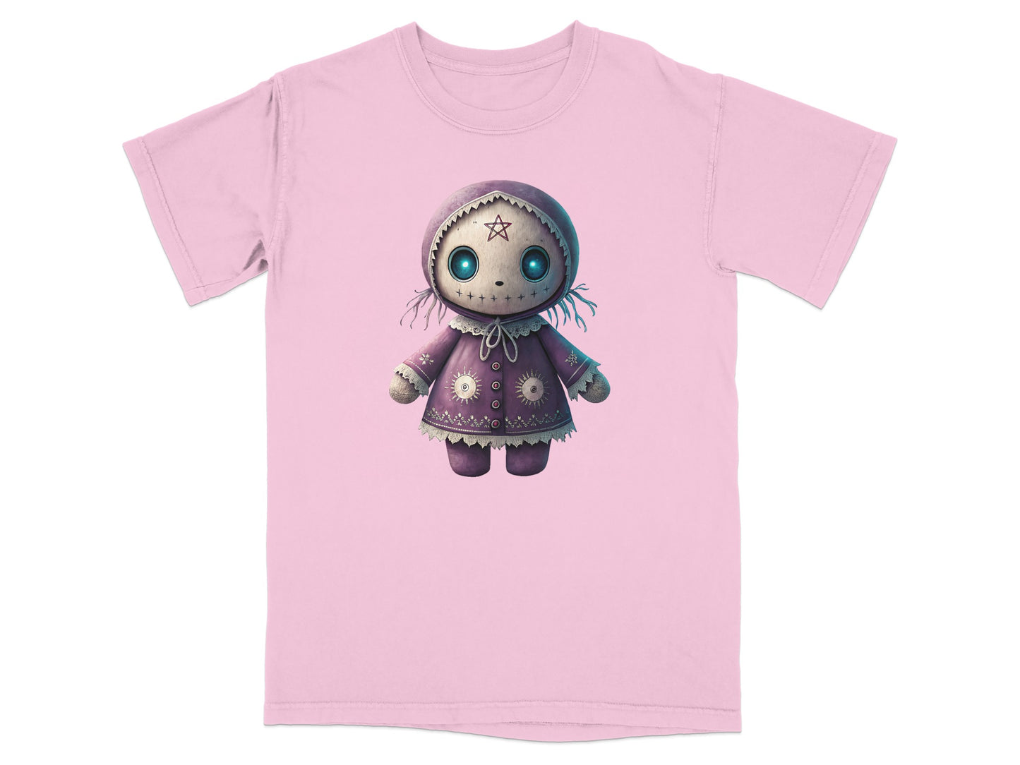 Pink t-shirt with a cartoon doll graphic featuring large starry eyes and intricate stitching.