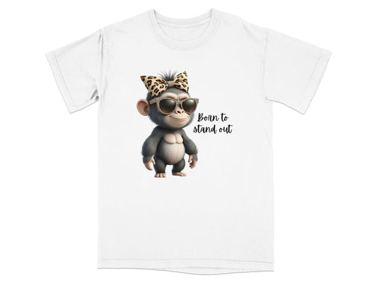 T-shirt with cartoon chimpanzee wearing sunglasses and leopard print bow.