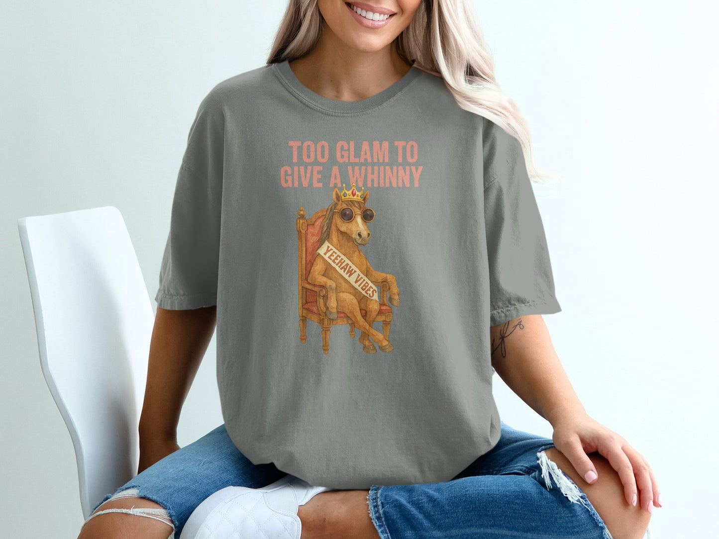 T-shirt with a cartoon horse wearing sunglasses and a crown, saying "YEENAW VIBES".
