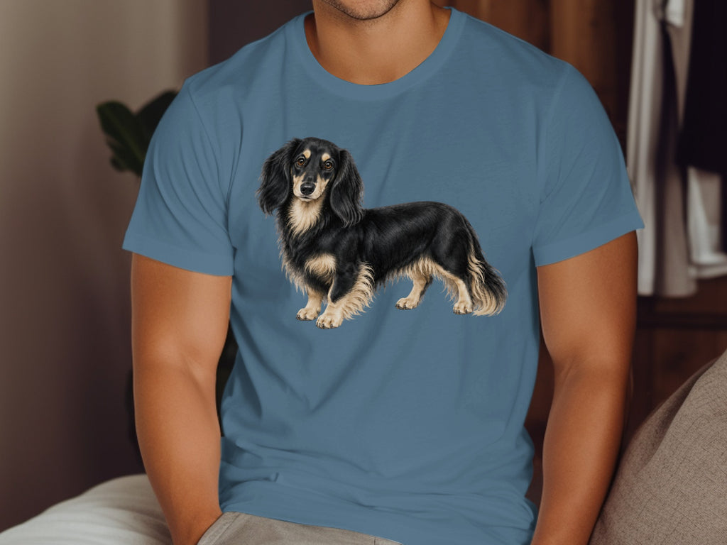 Long-haired black and tan dachshund illustration on a blue t-shirt.