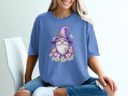 Purple gnome with flowers and butterflies on a t-shirt.