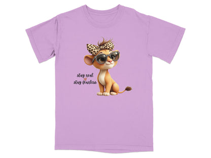 Lavender t-shirt with a cartoon lion cub wearing sunglasses and a leopard print bow.