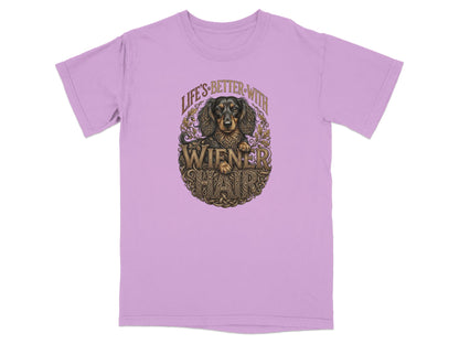 Lilac t-shirt with "Life's Better With Wiener Hair" and dachshund graphic.
