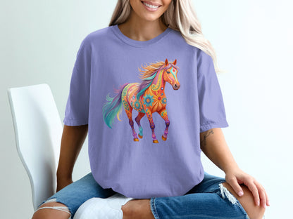 Purple t-shirt with colorful, ornate horse graphic.
