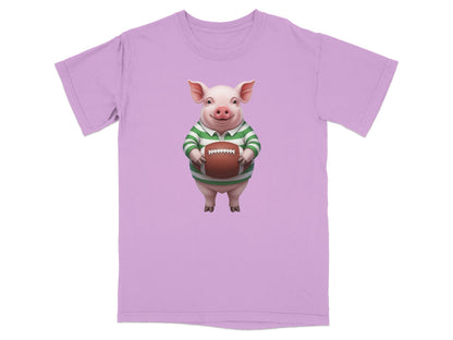 Lilac t-shirt with a cartoon pig holding a rugby ball.