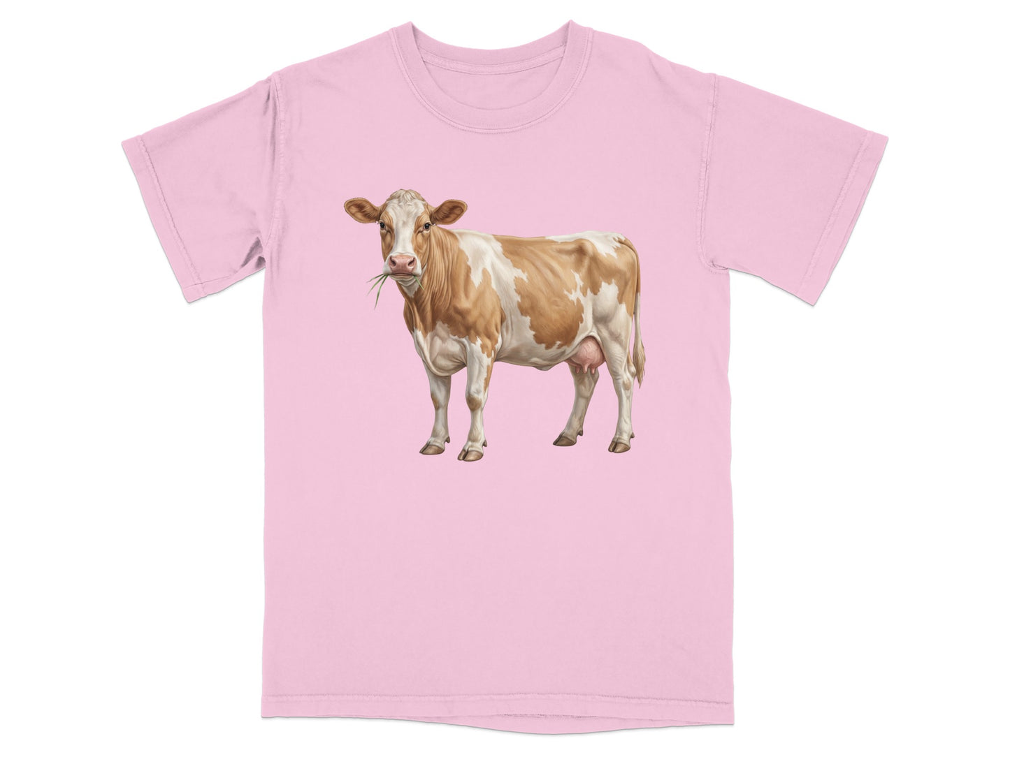 Pink t-shirt with a brown and white cow illustration eating grass.