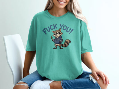 Teal t-shirt with raccoon graphic and text "FUCK YOU!".