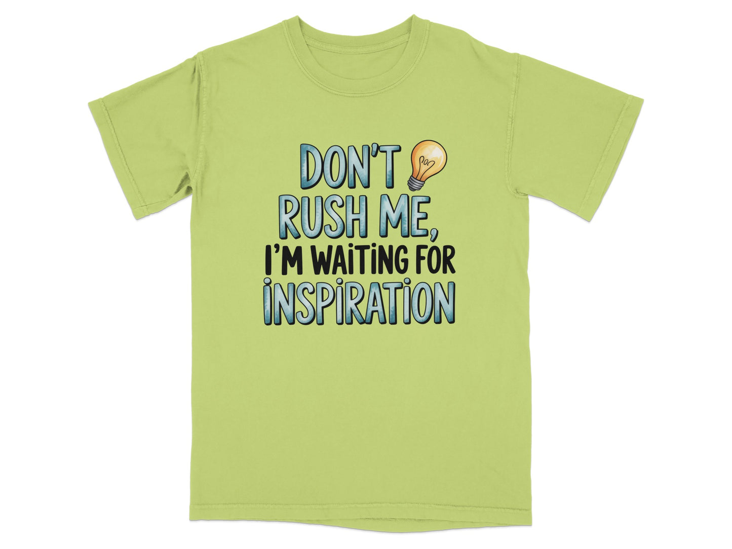 Light green t-shirt with text "Don't rush me, I'm waiting for inspiration."
