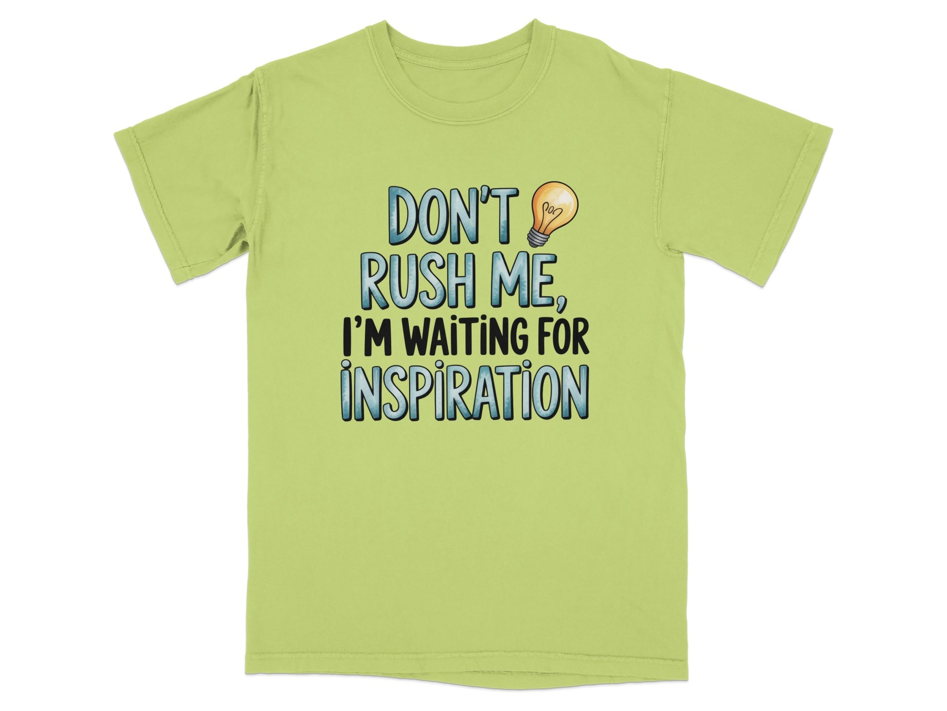 Light green t-shirt with text "Don't rush me, I'm waiting for inspiration."