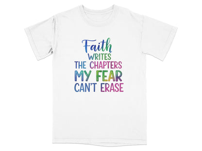 White t-shirt with colorful text reading "Faith WRITES MY FEAR CAN'T ERASE".