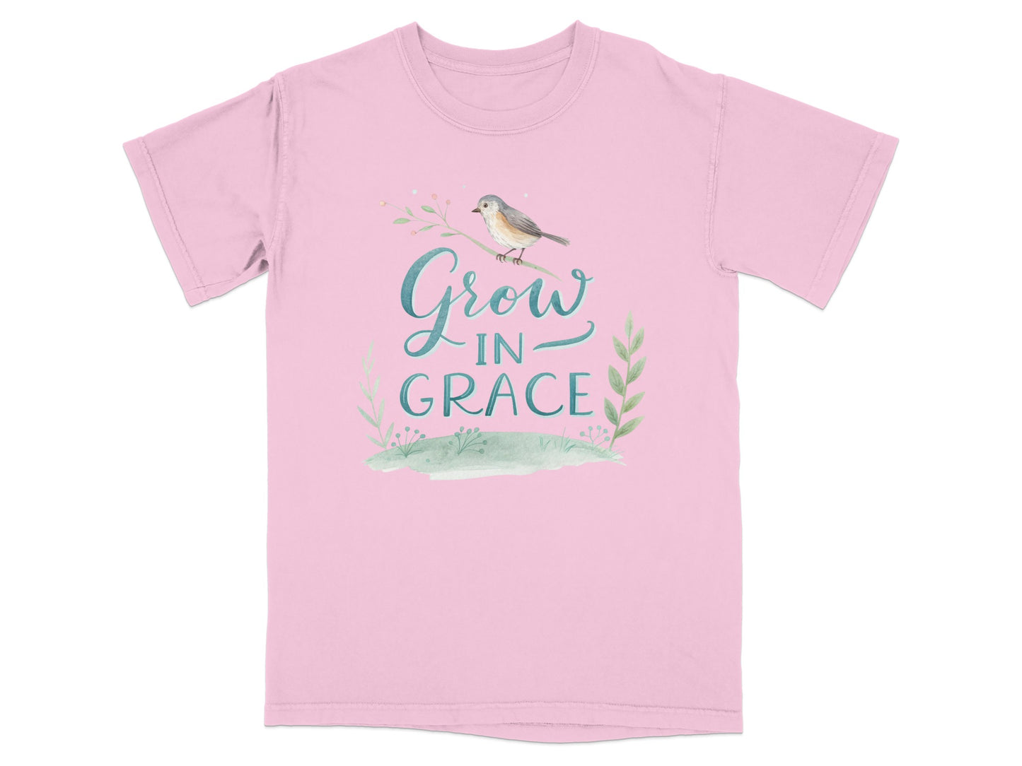 Pink t-shirt with "Grow in Grace" text and bird on a branch.