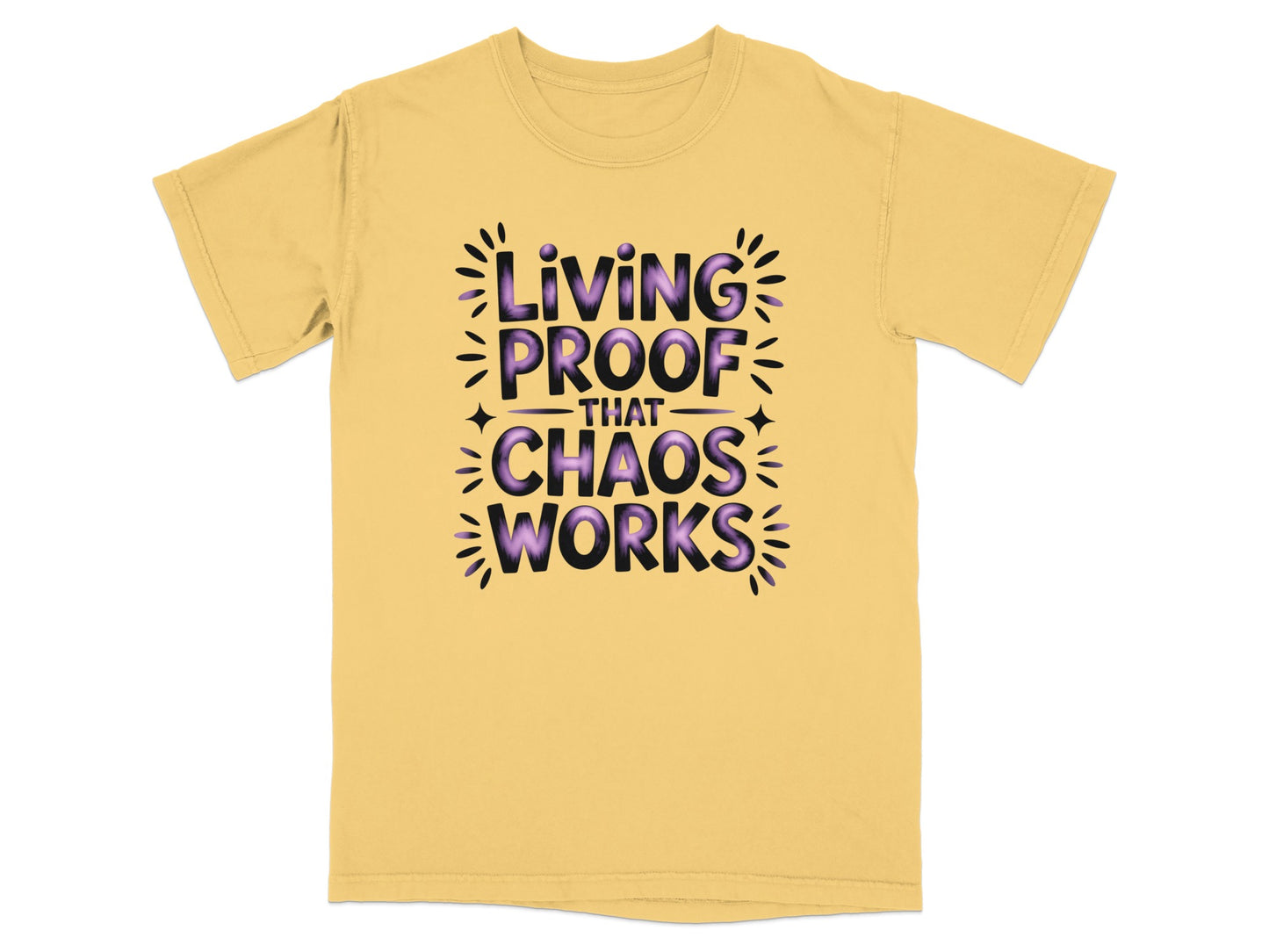 Yellow t-shirt with purple text reading "Living Proof That Chaos Works".