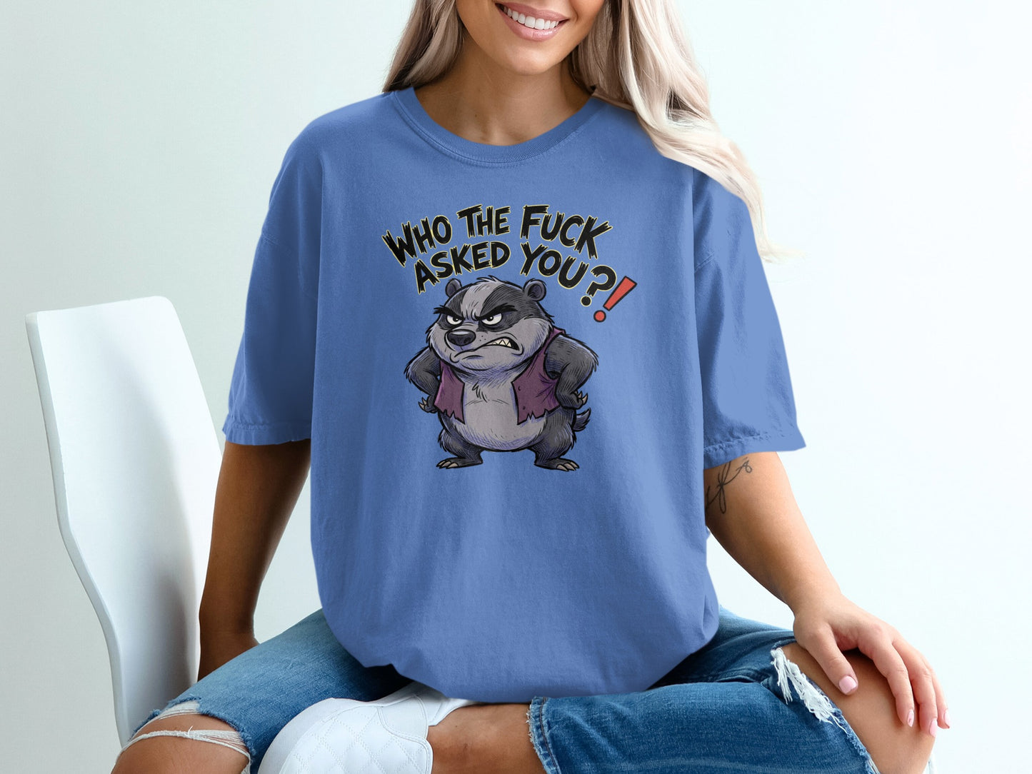 Blue t-shirt with cartoon badger and "WHO THE FUCK ASKED YOU?!" text.