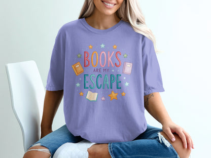 Lavender t-shirt with "Books are my escape" text and book illustrations.