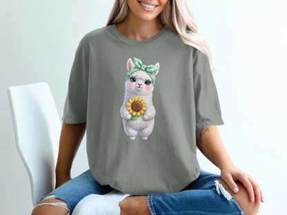 T-shirt featuring a cartoon llama in a bandana holding a sunflower.