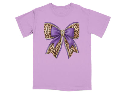 Lavender t-shirt with a large purple and leopard print bow with rhinestones.
