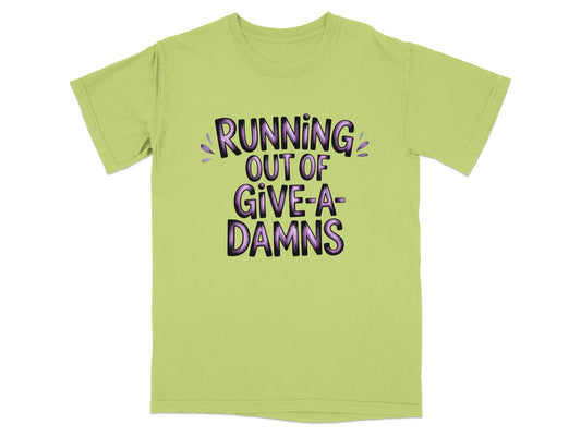 Light green t-shirt with purple text "RUNNING OUT OF GIVE-A-DAMNS".