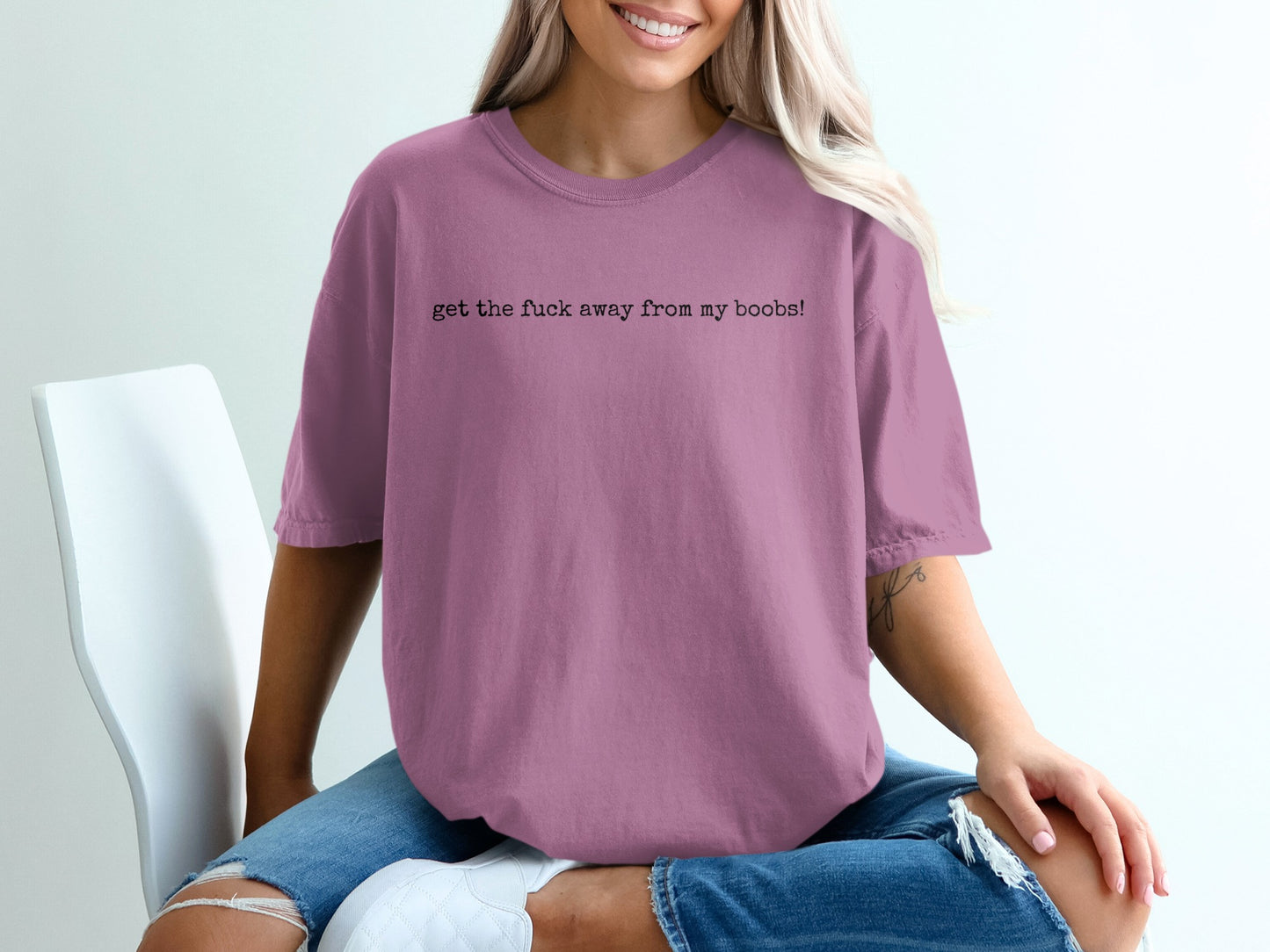 Mauve t-shirt with black text "get the fuck away from my boobs!".