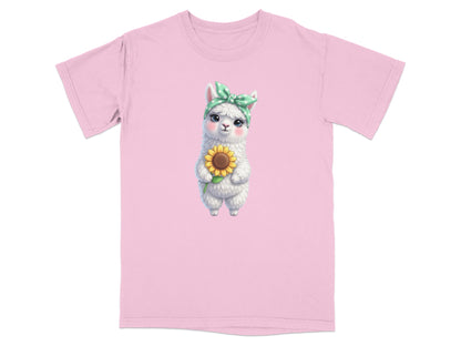 Cute llama wearing a bandana holds a sunflower, printed on a pink t-shirt.