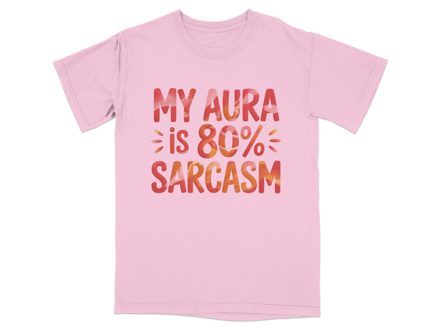 Pink t-shirt with "MY AURA IS 80% SARCASM" text in colorful gradient.