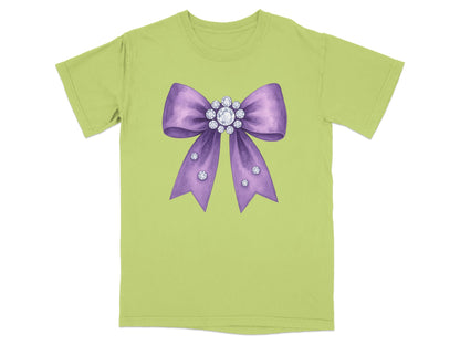 Light green t-shirt with a watercolor purple bow embellished with rhinestones.