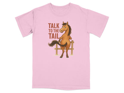Pink t-shirt with cartoon horse saying "Talk to the Tail".