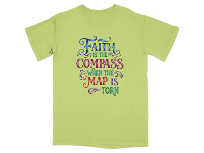 Light green t-shirt with "Faith is the compass when the map is torn" text.