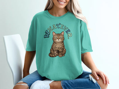 Cat sitting with "WHATEVER" text above.