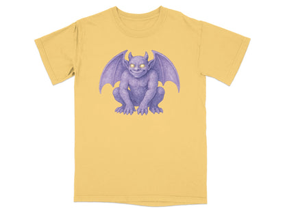 Yellow t-shirt with a purple gargoyle illustration.